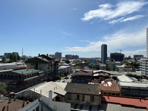 een uitzicht op de stad met gebouwen bij Galardon AyC in Concepción