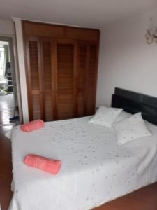 Ein Bett oder Betten in einem Zimmer der Unterkunft APARTA-HOTEL BADEN