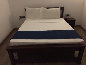Una cama o camas en una habitación de Cinnamon Heaven