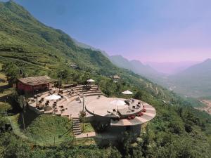 an aerial view of a building on a mountain at Ville De Mont Mountain Resort in Sa Pa