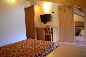 Postel nebo postele na pokoji v ubytování Hotel Canada