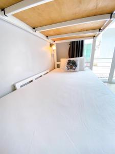 Postel nebo postele na pokoji v ubytování Khaolak Mind Home Hostel