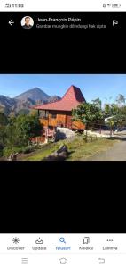 a screenshot of a webpage of a house at Home stay wolokoro ecotourism in Bajawa