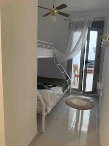 Postel nebo postele na pokoji v ubytování Apartamento Mateo Carboneras