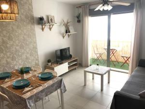 TV a/nebo společenská místnost v ubytování Apartamento Mateo Carboneras