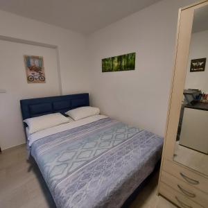 Postel nebo postele na pokoji v ubytování Apartments Mohar II