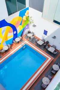 an overhead view of a swimming pool in a building at Monty Suites Lekki in Lagos