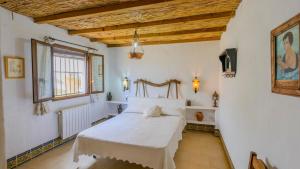 Postel nebo postele na pokoji v ubytování El Garrotal - El Aceite Almazara El Bosque by Ruralidays + 8 fotografií