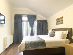 Voodi või voodid majutusasutuse Villa Mtashi toas