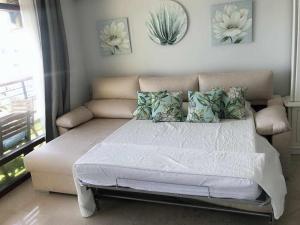 Posteľ alebo postele v izbe v ubytovaní Apartamento castillo de Santa Clara Sweet&Beach
