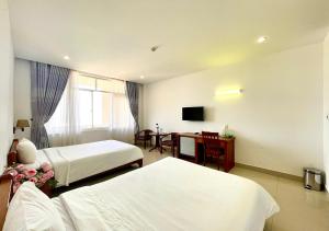 Katil atau katil-katil dalam bilik di My Khe 2 Da Nang Seafront Hotel