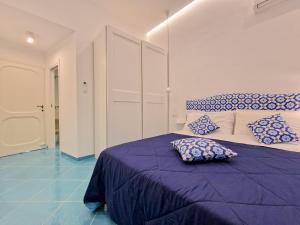 Postel nebo postele na pokoji v ubytování Il Cantuccio Rooms + 27 fotografií