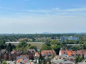 a view of a city with houses and buildings at Chic City-View Apartments in Hanau in Hanau am Main