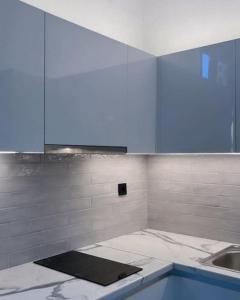 a white bathroom with a sink and a tub at no.21house studio apartment in Rio
