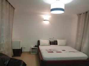 Postel nebo postele na pokoji v ubytování Meka Hotel