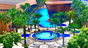 an overhead view of a pool at a resort at Rihanna service suite at times square in Kuala Lumpur
