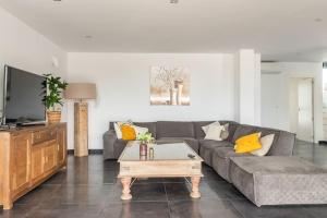 a living room with a couch and a coffee table at Villa in Finestrat in Finestrat