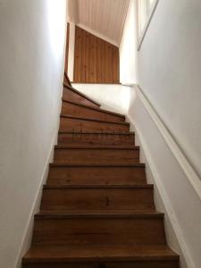 a staircase in a house with wooden steps at BREINER 28 in Porto