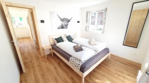 Postel nebo postele na pokoji v ubytování Yeti Lodge + 37 fotografií