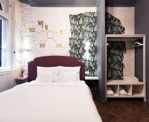 Posteľ alebo postele v izbe v ubytovaní Metropolis Budapest Boutique Hotel