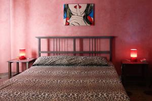 Ένα ή περισσότερα κρεβάτια σε δωμάτιο στο Casa Russo a Ficarra