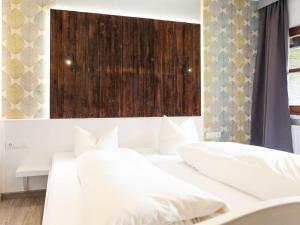 Postel nebo postele na pokoji v ubytování Apartment Sonnenhof Top 2 by Interhome