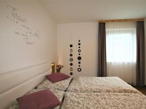 Postel nebo postele na pokoji v ubytování Apartment Kogler by Interhome