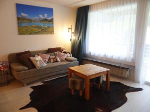 Кът за сядане в Apartment Sunnmatt Süd Wohnung 432 by Interhome