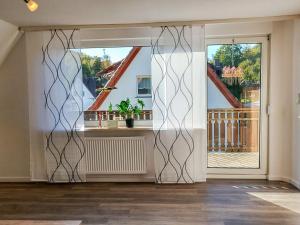 an open door to a room with a balcony at Apartment Am Meintetal by Interhome in Lügde