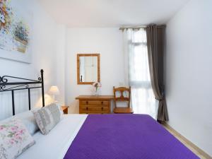 A bed or beds in a room at Apartment Comfy Altemar-2 by Interhome