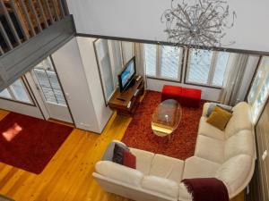 an overhead view of a living room with a white couch at Holiday Home Kelkka 1 by Interhome in Salla