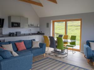 A seating area at Holiday Home Upper Milovaig by Interhome