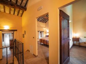 A bed or beds in a room at Holiday Home Il Feudo by Interhome
