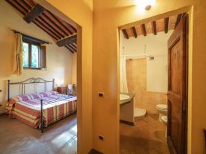 A bed or beds in a room at Holiday Home Il Feudo by Interhome