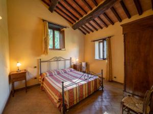 A bed or beds in a room at Holiday Home Il Feudo by Interhome