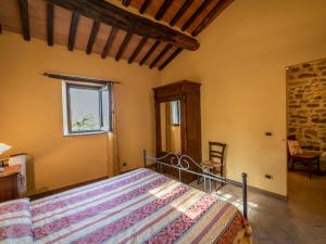 A bed or beds in a room at Holiday Home Il Feudo by Interhome