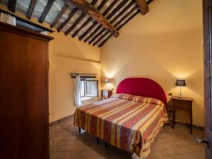 A bed or beds in a room at Holiday Home Il Feudo by Interhome