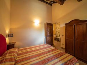 A bed or beds in a room at Holiday Home Il Feudo by Interhome