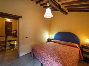 A bed or beds in a room at Holiday Home Il Feudo by Interhome