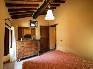 A bed or beds in a room at Holiday Home Il Feudo by Interhome