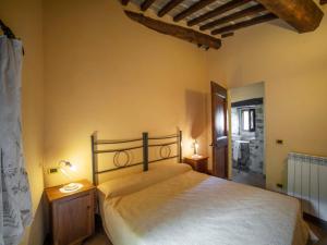 A bed or beds in a room at Holiday Home Il Feudo by Interhome