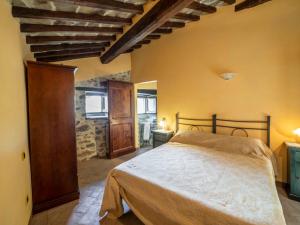 A bed or beds in a room at Holiday Home Il Feudo by Interhome