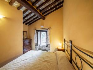 A bed or beds in a room at Holiday Home Il Feudo by Interhome
