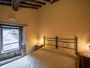 A bed or beds in a room at Holiday Home Il Feudo by Interhome