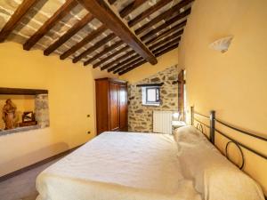 A bed or beds in a room at Holiday Home Il Feudo by Interhome
