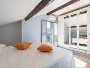 A bed or beds in a room at Apartment Gabriella by Interhome