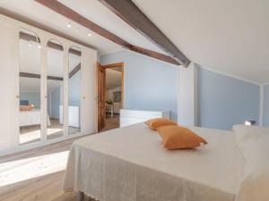 A bed or beds in a room at Apartment Gabriella by Interhome