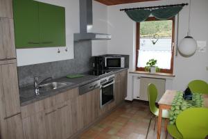 Dapur atau dapur kecil di Holiday Home Rehsiepen