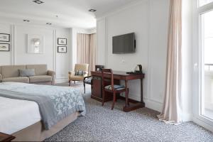 TV a/nebo společenská místnost v ubytování Hotel de Londres y de Inglaterra