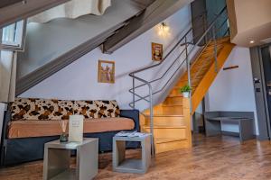Posezení v ubytování La Maison Rouge